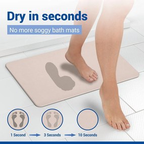 Béžová kúpeľňová predložka z kremeliny 39x60 cm Simi – Wenko