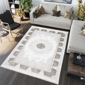 Jemný vintage koberec s hnedými ornamentmi Šírka: 80 cm | Dĺžka: 150 cm