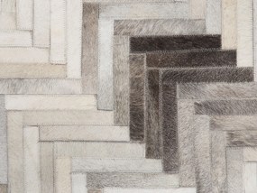 Kožený koberec 140 x 200 cm sivá/béžová ARSUZ Beliani