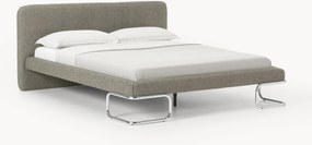 Buklé čalúnená posteľ s kovovými nohami Olina