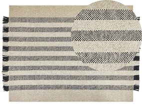 Vlnený koberec 160 x 230 cm krémová biela/čierna TACETTIN Beliani