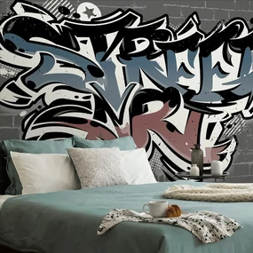 Tapeta s tehlovou imitáciou a nápisom Street Art