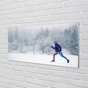 Obraz plexi Les v zime sneh muž 125x50 cm