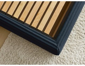 Tmavomodrá čalúnená dvojlôžková posteľ s úložným priestorom a roštom 160x200 cm Jade – Bobochic Paris