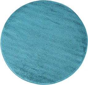 Okrúhly koberec modrej farby