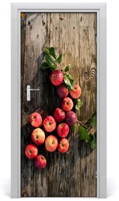 Fototapeta na dvere samolepiace jablká na stole 75x205 cm