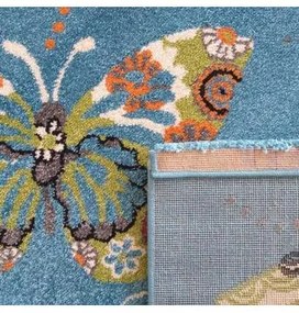 Modrý koberec s motívom Motýle