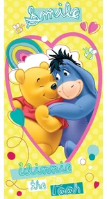 Žltá bavlnená detská osuška 70x140 cm Winnie the Pooh "Smile" – Jerry Fabrics
