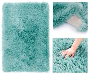 Huňatý modrý koberec DOKKA Rozmer: 75 x 120 cm