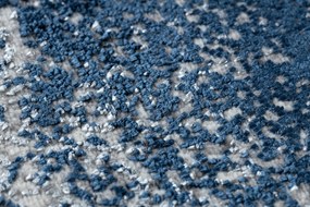 Moderný koberec DE LUXE 528 Abstrakcia - Štrukturálny krém  / tmavomodrý