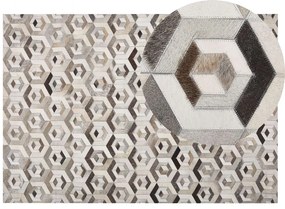 Kožený koberec 140 x 200 cm hnedá/béžová TAVAK Beliani