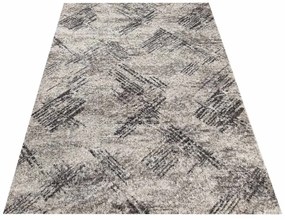 Originálny vzorovaný koberec do obývačky béžovej farby Šírka: 60 cm | Dĺžka: 100 cm