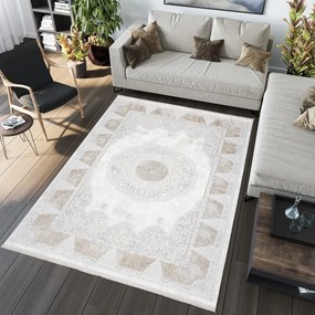 Jemný vintage koberec s béžovými ornamentmi Šírka: 120 cm | Dĺžka: 170 cm
