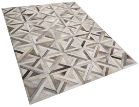 Kožený koberec 140 x 200 cm hnedá/béžová TAYTAN Beliani