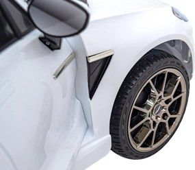 Ramiz Aston Martin DBX na batérie pre deti Biely + diaľkové ovládanie + EVA + pásy + pomalý štart + LED zvuk