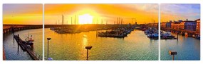 Obraz prístavu pri zapadajúcom slnku