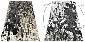 Moderný koberec DE LUXE 2079 Štrukturálny zlatý / sivý