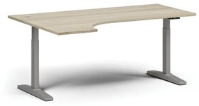 Výškovo nastaviteľný stôl, elektrický, 675-1325 mm, rohový ľavý, doska 1800x1200 mm, sivá podnož, dub prírodný