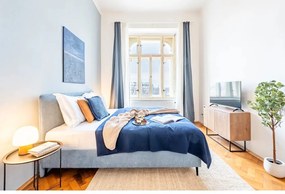 Modrá čalúnená dvojlôžková posteľ s roštom 180x200 cm Noira Slim – Bonami Selection