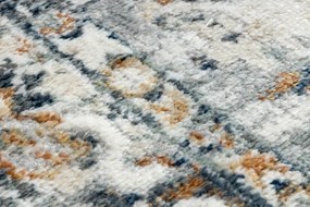 Koberec DISTIN 0834A tmavomodrá / modrá / žltá - ornament, vintage, strapce