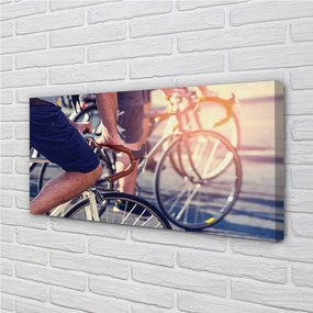 Obraz canvas cyklisti ľudí 125x50 cm