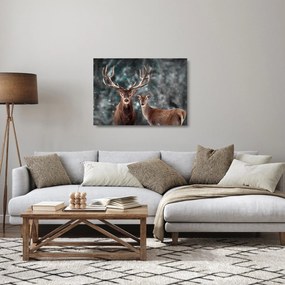 Sklenený obraz - Jeleň a laň v zasneženom lese (70x50 cm)