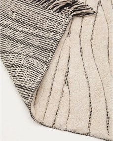 Béžová kúpeľňová predložka 50x70 cm Crilda – Kave Home