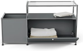 Kovová nízka skrinka »CN3« s výklopným priečinkom a sklenenou doskou, sivá