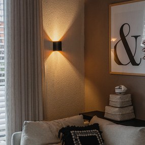 Moderná nástenná lampa čierna s mosadzou - Sabbio