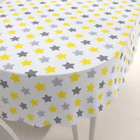 Biante Detský bavlnený oválny obrus Sandra SA-203 Žlto-sivé hviezdy 120x140 cm