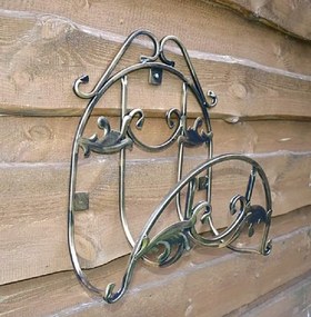 Kovový nástenný držiak na záhradnú hadicu Arnaut, 48x35 cm, zlatá