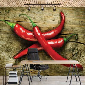 Fototapeta - Chili papričky na dreve (152,5x104 cm)