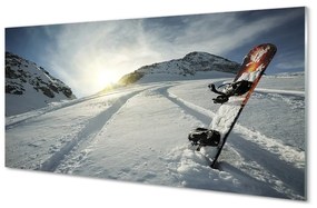 Obraz na skle Doska v snehu horách 140x70 cm