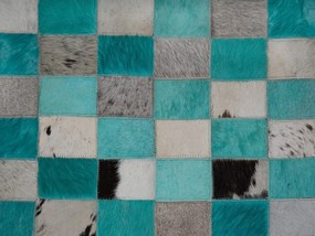 Kožený koberec 160 x 230 cm tyrkysová/sivá NIKFER Beliani