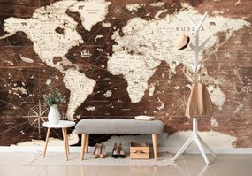 Tapeta historická mapa sveta na drevenom pozadí