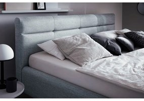 Modrá čalúnená dvojlôžková posteľ s úložným priestorom s roštom 180x200 cm Lotte - Meise Möbel