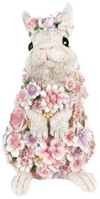 Veľkonočný zajac v kvetine stojaci