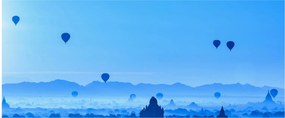 Obraz - Balóny nad krajinou (120x50 cm)