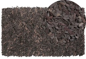 Kožený koberec 80 x 150 cm tmavohnedý MUT Beliani