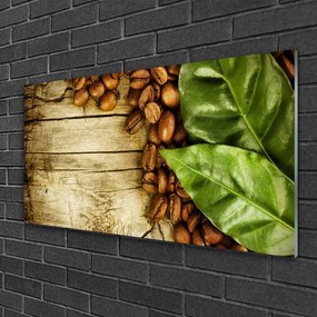 Obraz na skle Zrnká káva listy kuchyňa 140x70 cm