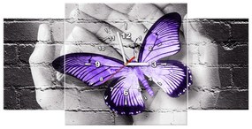 Gario Obraz s hodinami Fialový motýľ na dlaniach - 3 dielny Rozmery: 100 x 70 cm