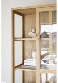 Vitrína v dekore duba s posuvnými dverami v prírodnej farbe 100x203 cm Hazelton – Rowico