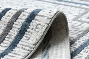 Koberec TULS 51242 Ramka slonia kosť / modrý
