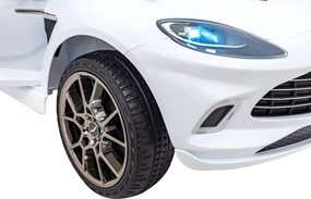 Ramiz Aston Martin DBX na batérie pre deti Biely + diaľkové ovládanie + EVA + pásy + pomalý štart + LED zvuk