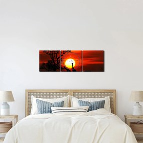Obraz - Siluety zvierat pri západe slnka (s hodinami) (90x30 cm)