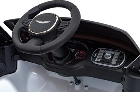 Ramiz Aston Martin DBX na batérie pre deti Biely + diaľkové ovládanie + EVA + pásy + pomalý štart + LED zvuk