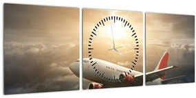 Obraz - Lietadlo v oblakoch (s hodinami) (90x30 cm)