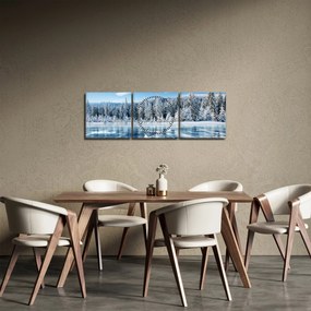 Obraz zamrznutého jazera a zasnežených stromov (s hodinami) (90x30 cm)