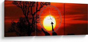 Obraz - Siluety zvierat pri západe slnka (s hodinami) (90x30 cm)