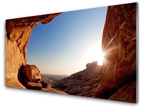 Obraz na skle Skala slnko krajina 140x70 cm